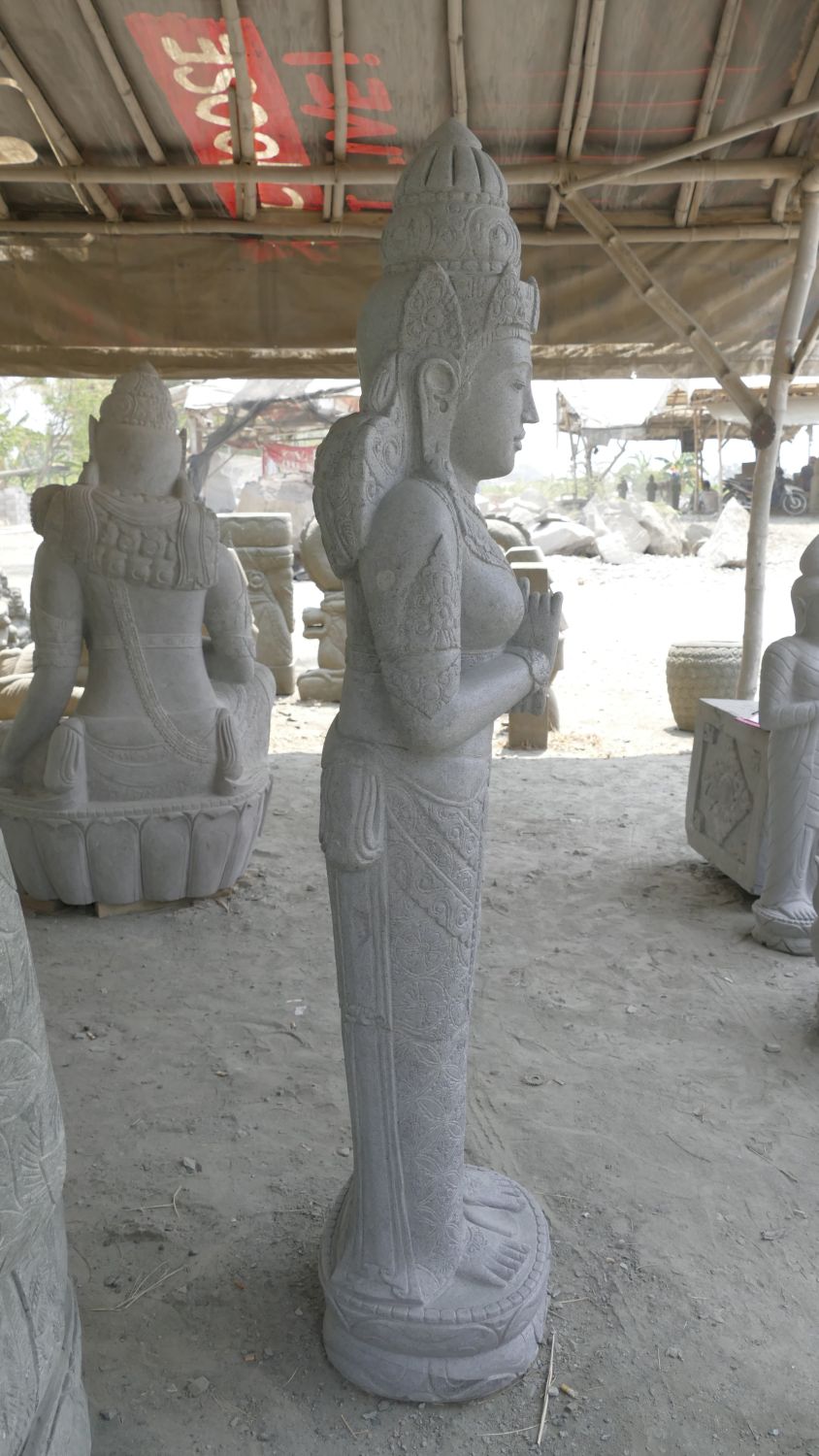  Product image 6 of the product “Standing Sri Dewi. Made from riverstone. Height 180cm ”